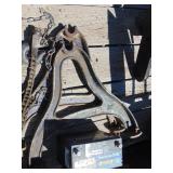 (2) cast iron bell yokes marked 