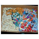 Flat full of costume beaded necklaces