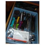 Whole drawer of kitchen flatware and utensils