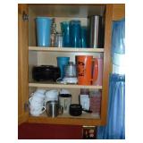 Entire cabinet full of misc. tumblers plus