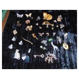 Large Lot of Costume Brooches and pins