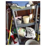 Plastic shelf full of gardening plus