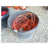 Tub full of extension cords and drop cord