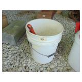 bucket full of pipe wrenches