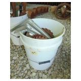 bucket full of plater gears, plus