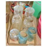Flat full antique canning jars