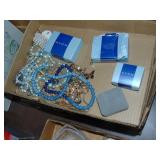 flat full of costume jewelry