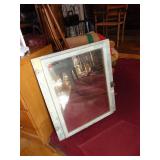 Primitive mirrored cabinet door..