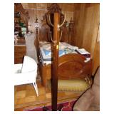 Walnut coat rack, brass type hooks