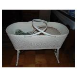 White wicker bassinet (on wheels)