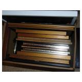 box of picture frames and photo album