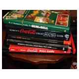 Stack of Coca-Cola Guide Books