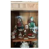 Shelf Full Of Santas & Christmas Decor