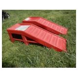 Pair of orange metal ramps