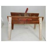 vintage walnut husker on wood -4 legged stand