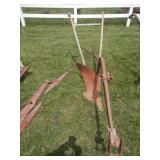 Rusty primitive steel beam plow, approx 17" plow