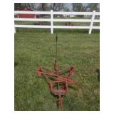 Red painted steel horse drawn cultivator