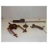 4 antique cast rust items-duster, hitch w/rings