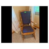 Wooden rocking chair blue dotted cushions