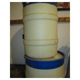 2 plastic liquid storage barrels