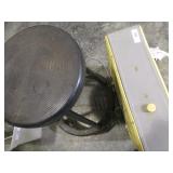 Box fan and 30" black plastic stool