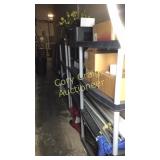 3 Plastic Storage Racks with contents except was