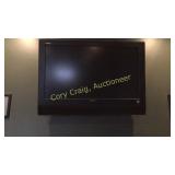 Soyo  42" TV  MUST REMOVE FROM WALL