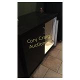 Cabinet section with door off, door is with it