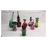 Group of colored glassware including cruet