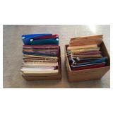 2 boxes misc. file folders and tablets Front Room