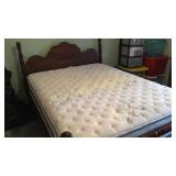 Full-size wood bed with Beautyrest Mattress