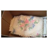 Box of dresser scarves and doillies