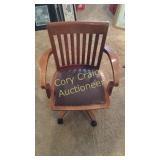 Wood Office Chair With Rollers Has Some Ware and