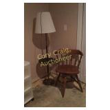 Floor Lamp and wood Swivel Chair. Basement