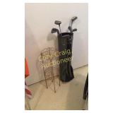 Plant Stand and Gold Clubs  OUT IN THE GRAGE