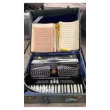 Accordion Model 306 and Music