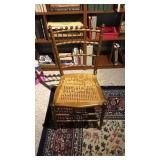 Antique Cane Bottom Chair IN THE BASEMENT
