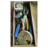 Metal tool box full of rivet guns and supplies