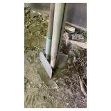 Assorted long handled tools hoes and scraper