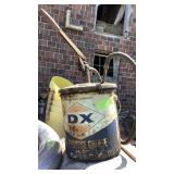 Old grease metal can with hand pump