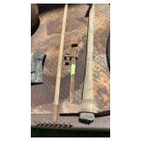 Garden rake, pipe wrench and pick ax