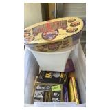 Tub of books, waste can and "better breaded"