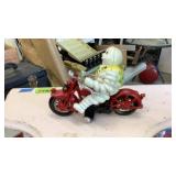 Cast Michelin man on motorcycle