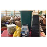 Waste basket and contents: bunge cords, bed