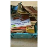 Flip tote full of magazines and books