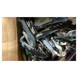Box full of assorted corkscrew bottle openers