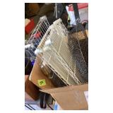 Box of shelving parts and decorative wire fish