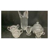 Assorted glass items: vase, cheeseball cover,