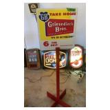 Griesedieck Bros beer advertising sign on stand