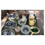 Pitchers, small lamp shades, mirror, clear glass,